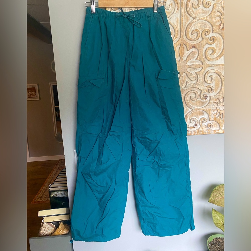 Teal parachute pants!